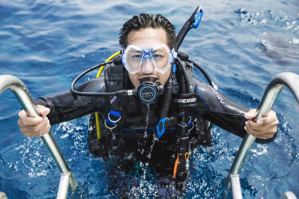 PADI Divmaster on the boat ladder.